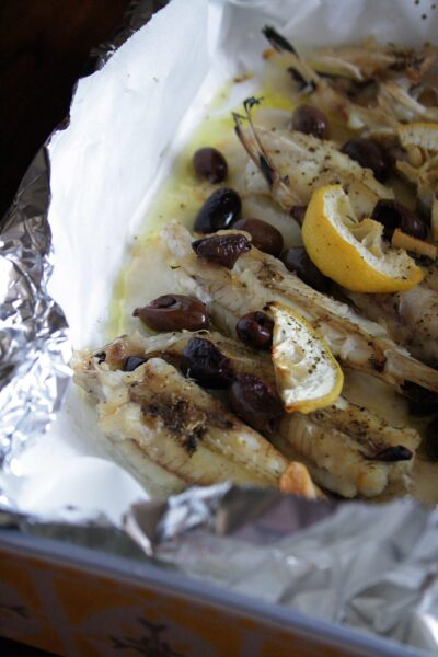 Code di rana pescatrice al limone – con olive taggiasche e origano –